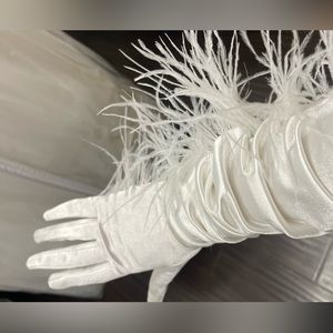 White gloves with feathers